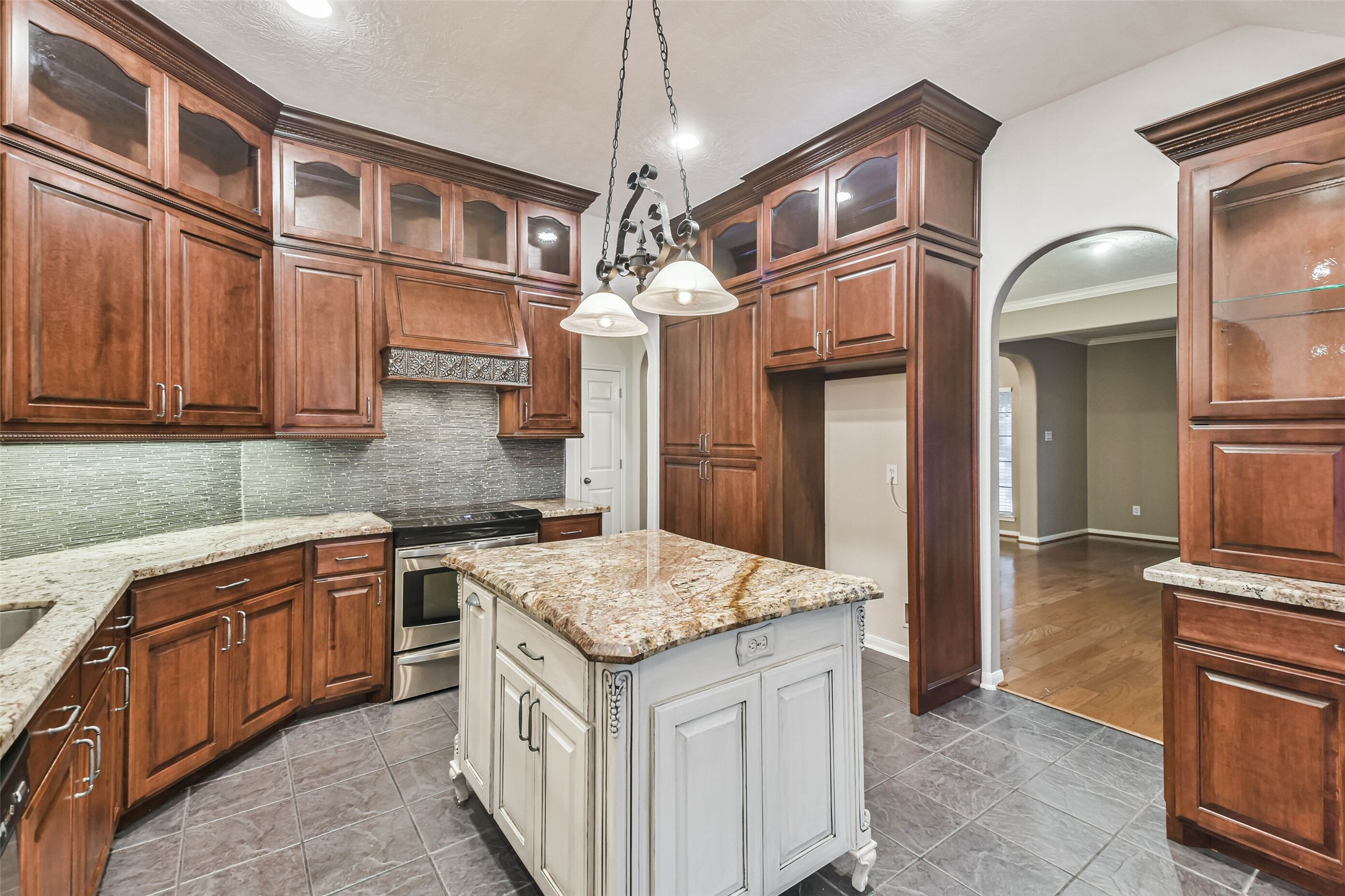 20942 Wind Field Lane Spring, TX 77379 - Photo 14 of 46 a kitchen with stainless steel appliances granite countertop a sink and cabinets