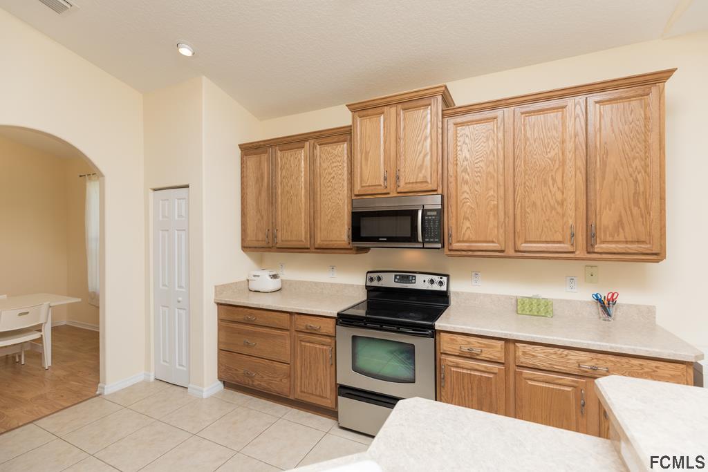 103 Raintree Circle Palm Coast, FL 32164 - Photo 11 of 43 Kitchen