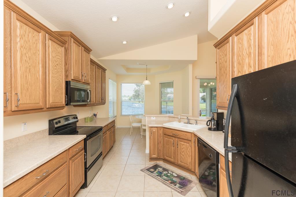 103 Raintree Circle Palm Coast, FL 32164 - Photo 12 of 43 Kitchen