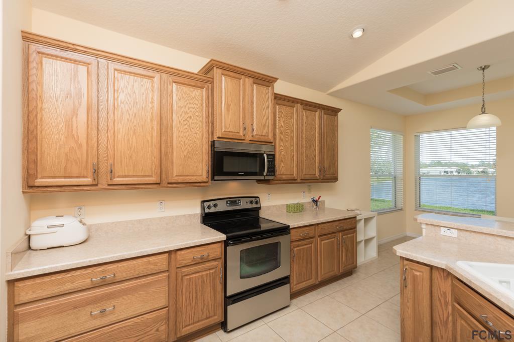 103 Raintree Circle Palm Coast, FL 32164 - Photo 13 of 43 Kitchen