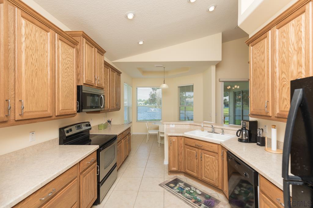 103 Raintree Circle Palm Coast, FL 32164 - Photo 14 of 43 Kitchen