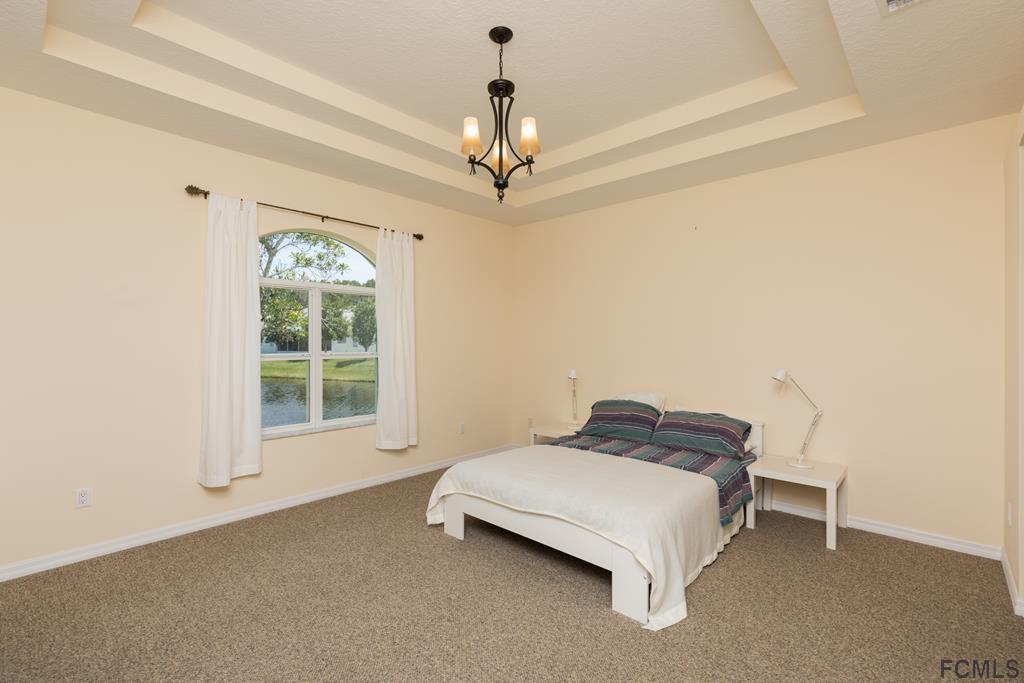 103 Raintree Circle Palm Coast, FL 32164 - Photo 20 of 43 Master bedroom