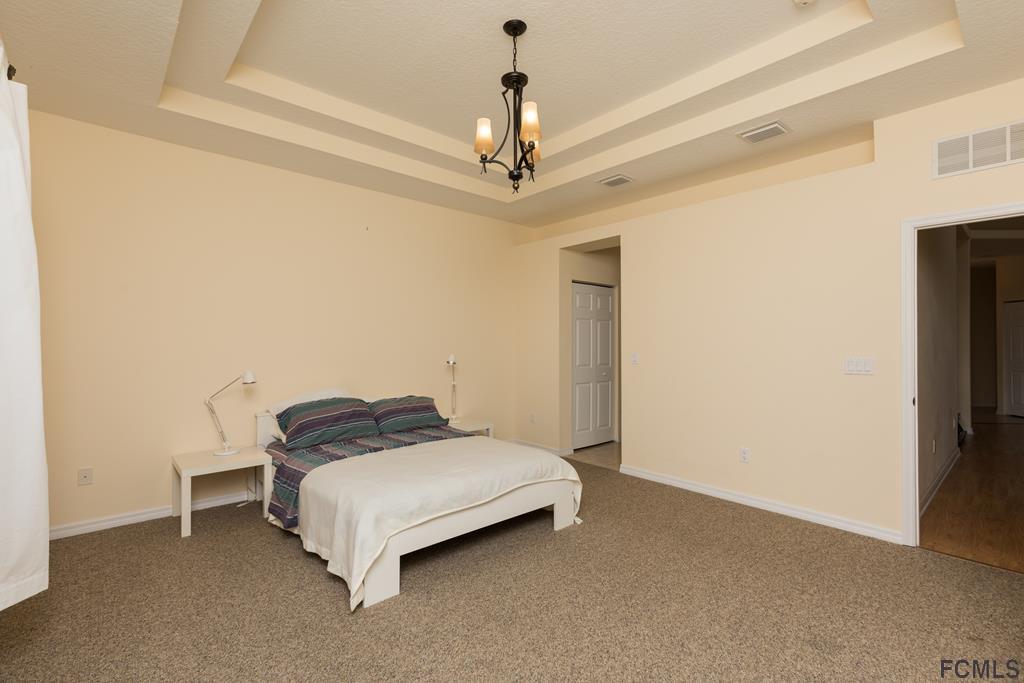 103 Raintree Circle Palm Coast, FL 32164 - Photo 21 of 43 Master bedroom