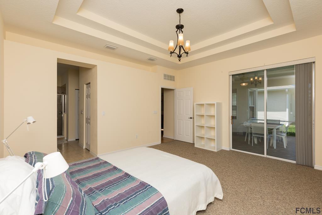 103 Raintree Circle Palm Coast, FL 32164 - Photo 22 of 43 Master bedroom