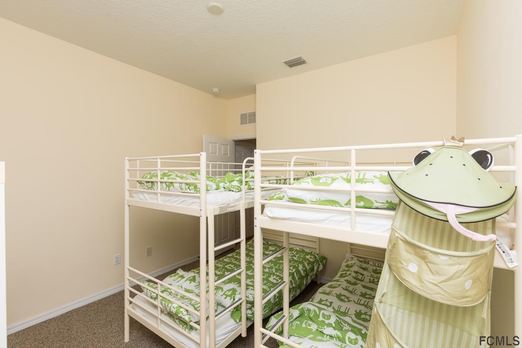 103 Raintree Circle Palm Coast, FL 32164 - Photo 31 of 43 Bedroom 3