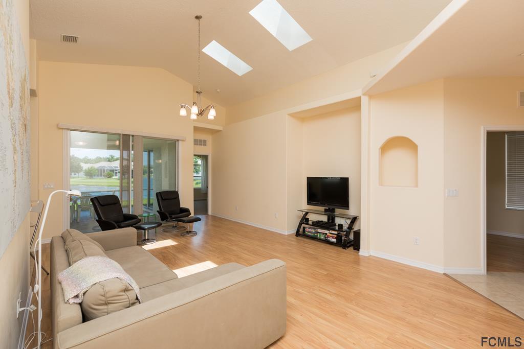 103 Raintree Circle Palm Coast, FL 32164 - Photo 6 of 43 Great room