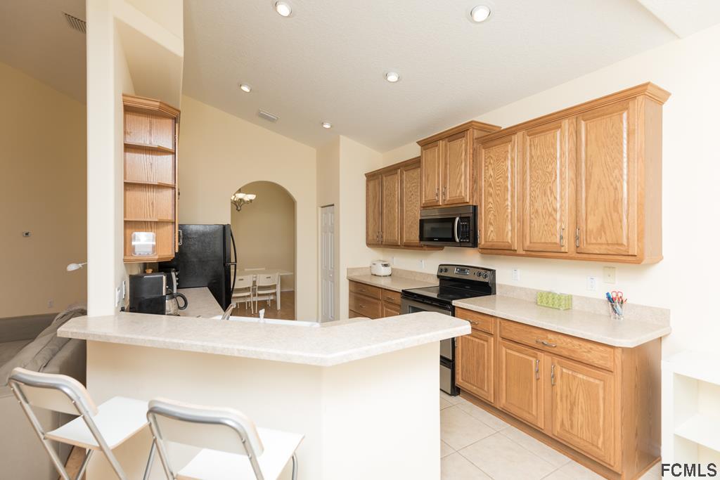 103 Raintree Circle Palm Coast, FL 32164 - Photo 9 of 43 Kitchen