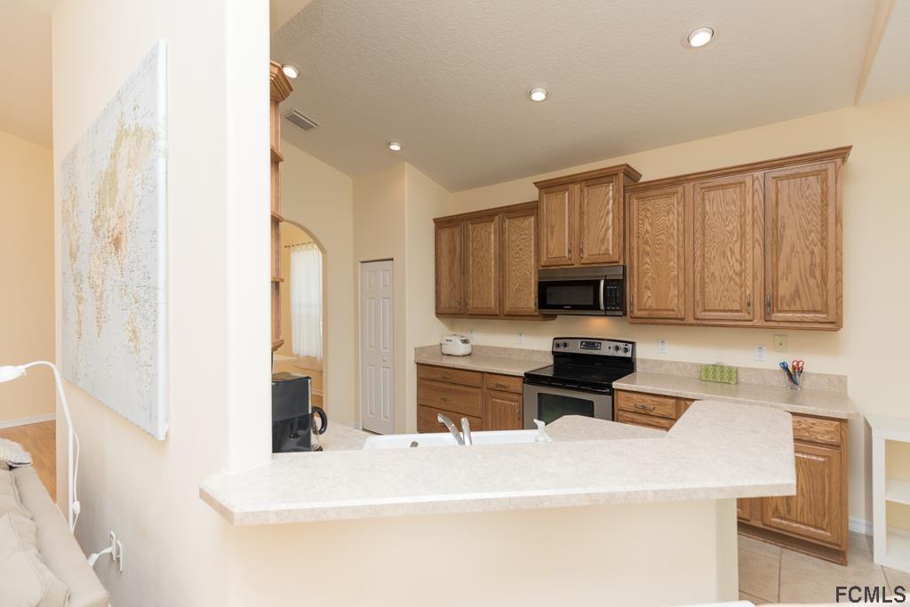 103 Raintree Circle Palm Coast, FL 32164 - Photo 10 of 43 Kitchen