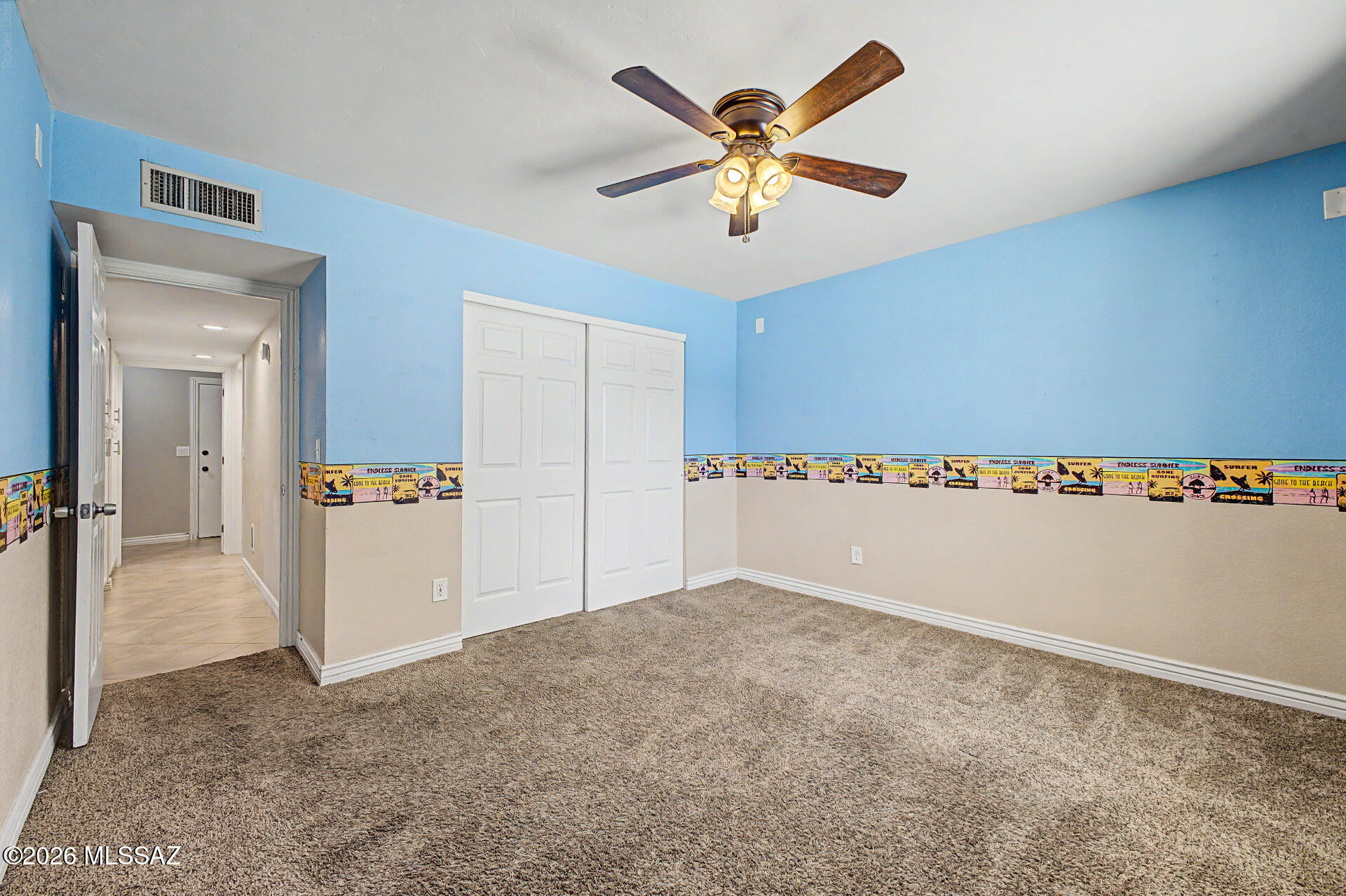 7550 East Rio Verde Drive Tucson, AZ 85715 - Photo 18 of 25 Ample closet space and thoughtful design make this bedroom both practical and inviting.