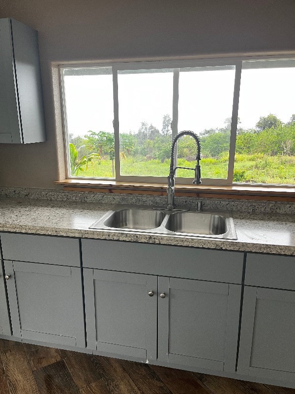 89-1368 Coffee Lots Road Captain Cook, HI 96704 - Photo 6 of 11 a sink with a granite countertop window
