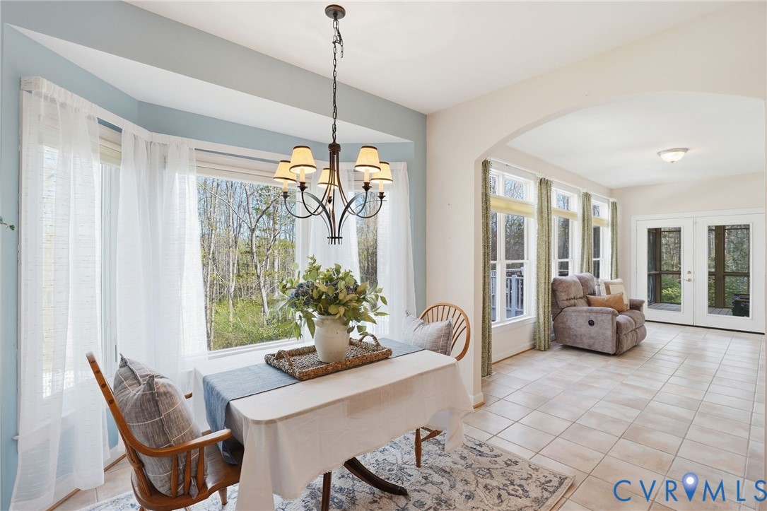 14430 Overlook Ridge Lane Beaverdam, VA 23015 - Photo 37 of 71 a living room with furniture and a large window