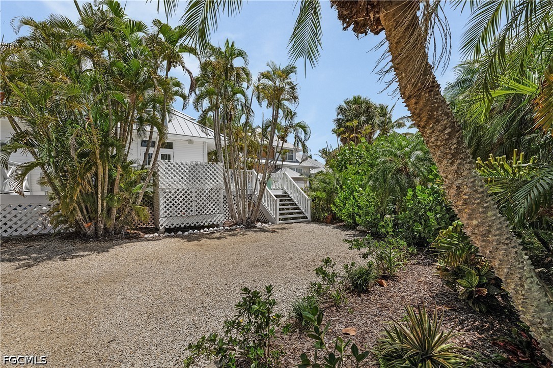 515 Useppa Useppa Island Bokeelia, FL 33922 - Photo 41 of 43 a street view with plants