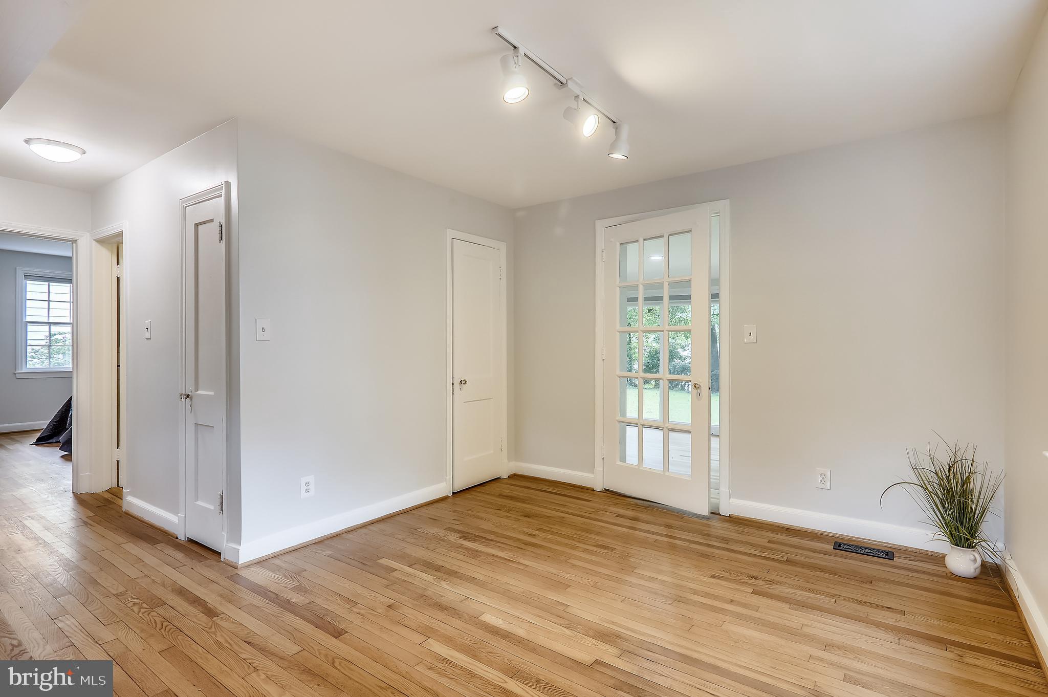 9311 Walden Road Silver Spring, MD 20901 - Photo 21 of 75 Dining Room View into Florida Room