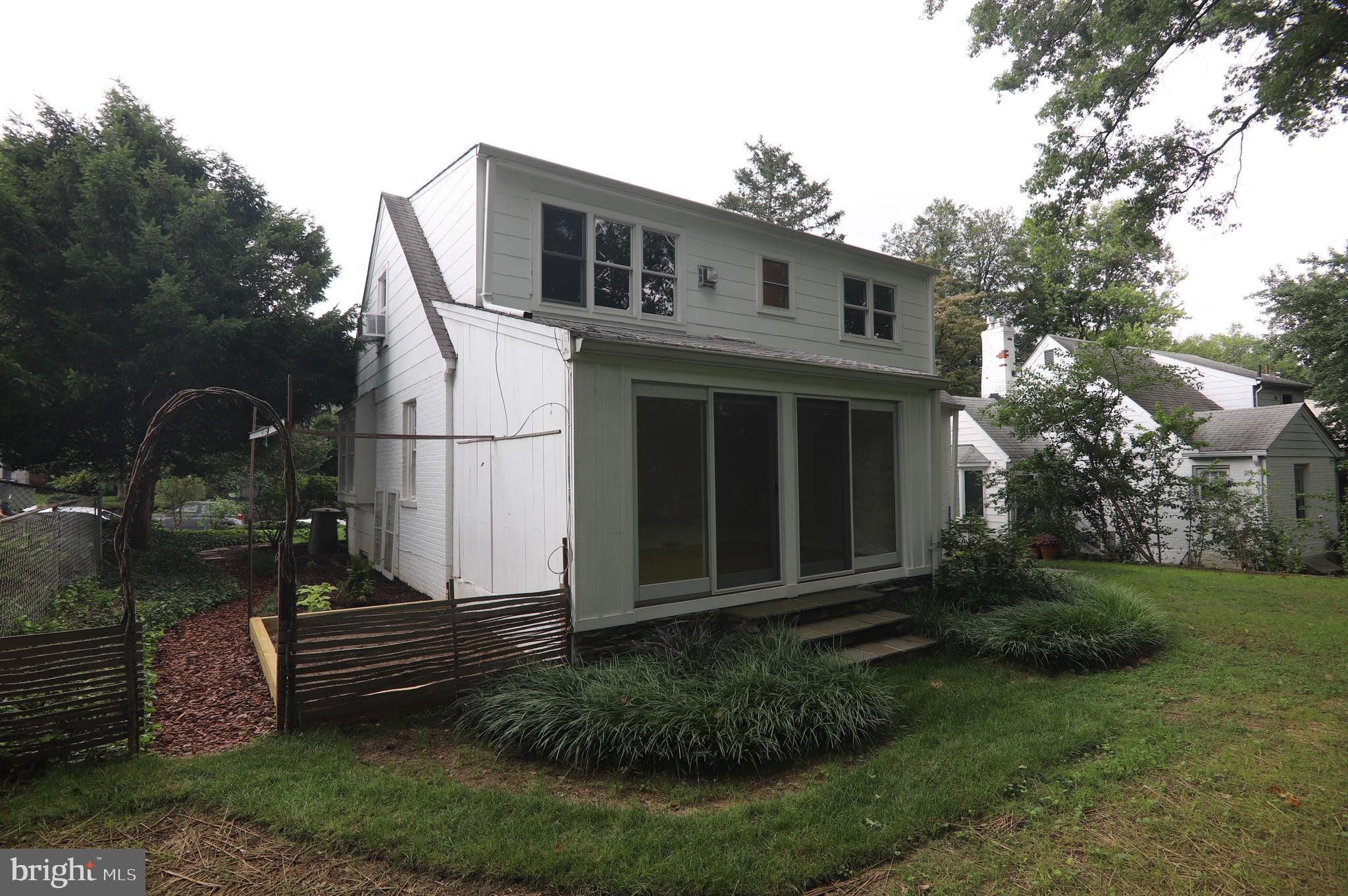 9311 Walden Road Silver Spring, MD 20901 - Photo 53 of 75 Rear View of Home with garden plot