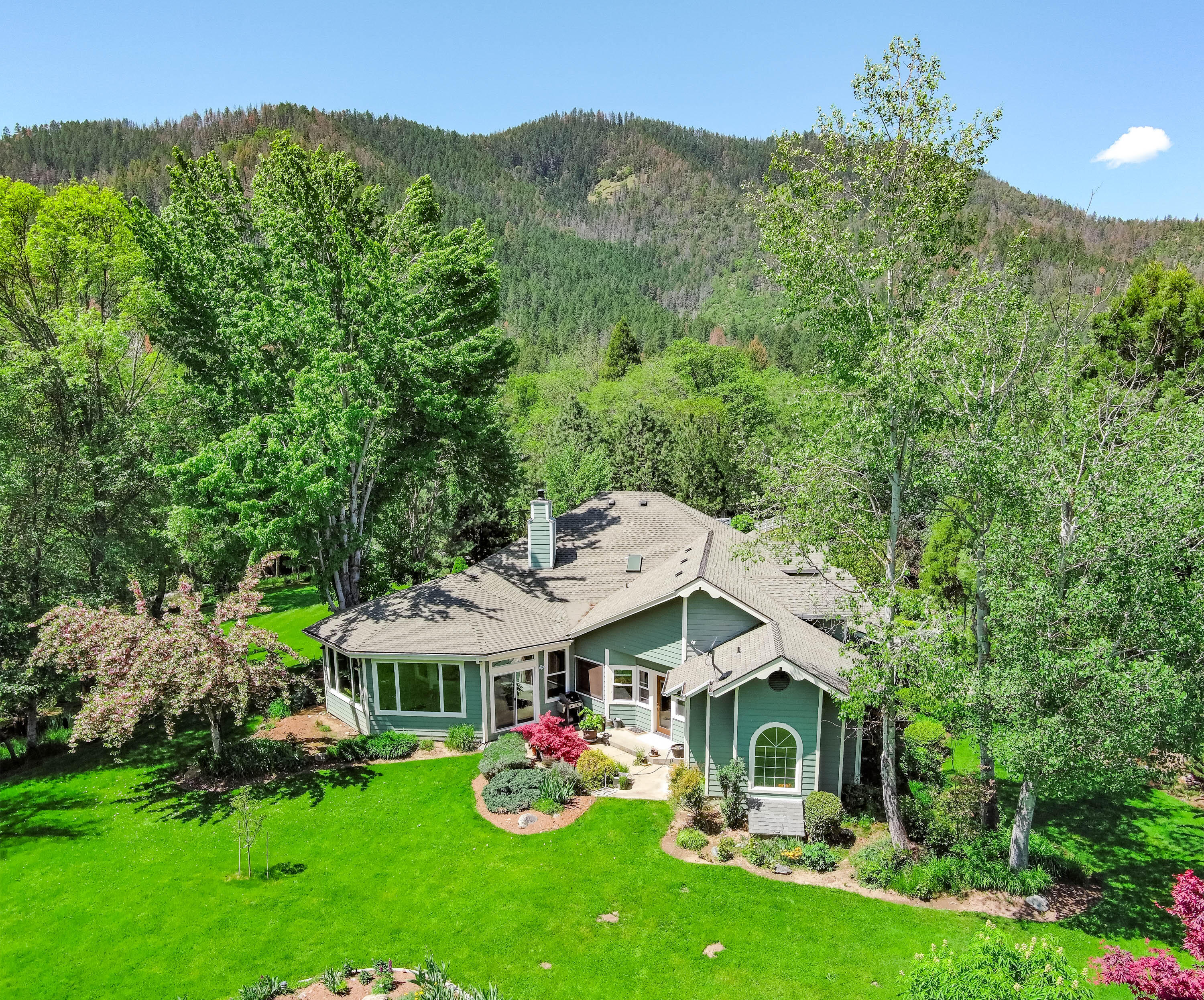 a aerial view of a house with garden