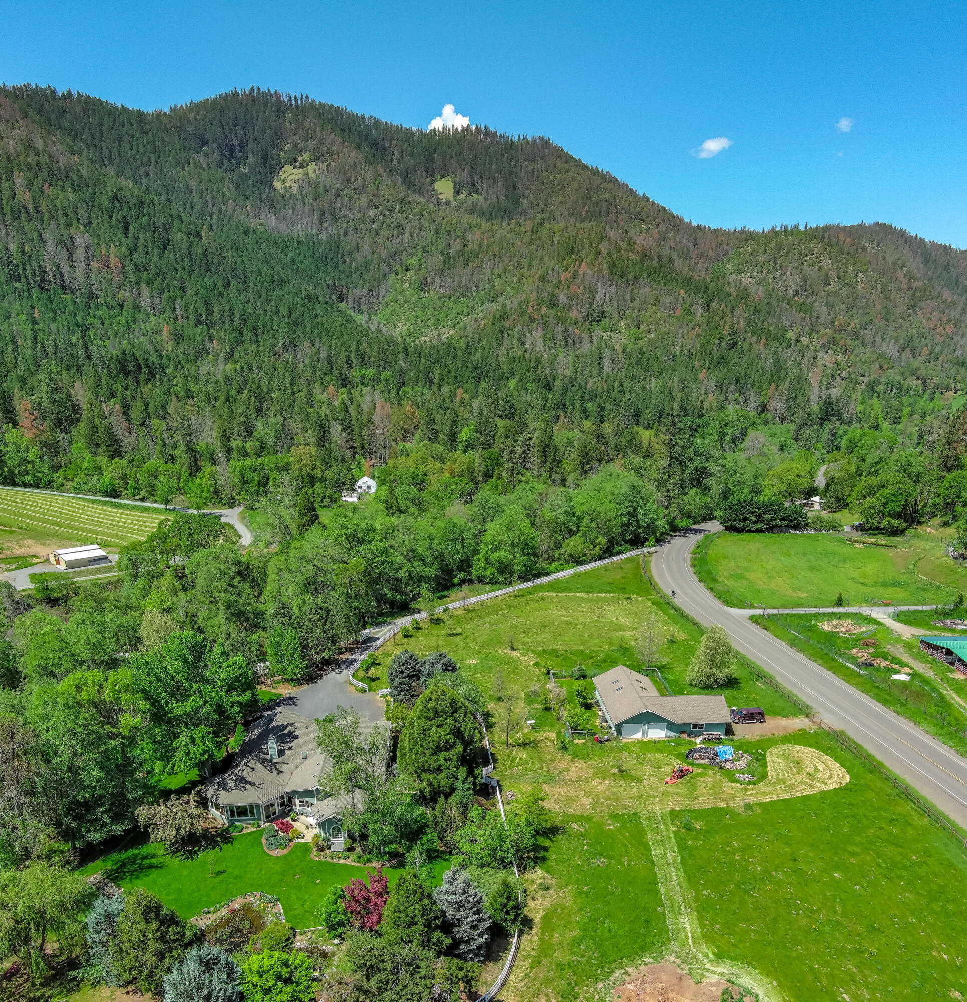 4000 Little Applegate Road Jacksonville, OR 97530 - Photo 39 of 47 a view of a lush green hillside and trees