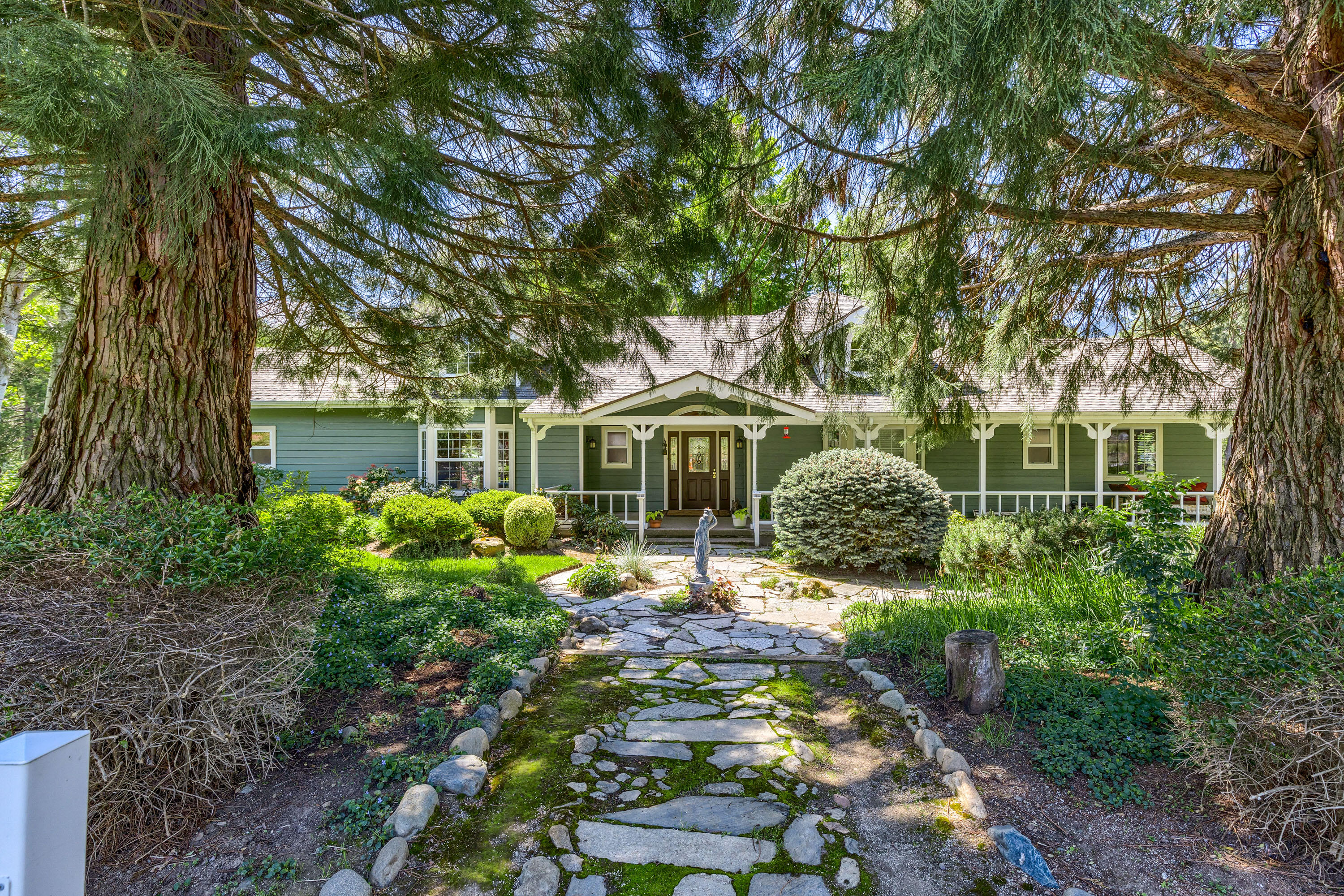 4000 Little Applegate Road Jacksonville, OR 97530 - Photo 42 of 47 a front view of a house with a yard