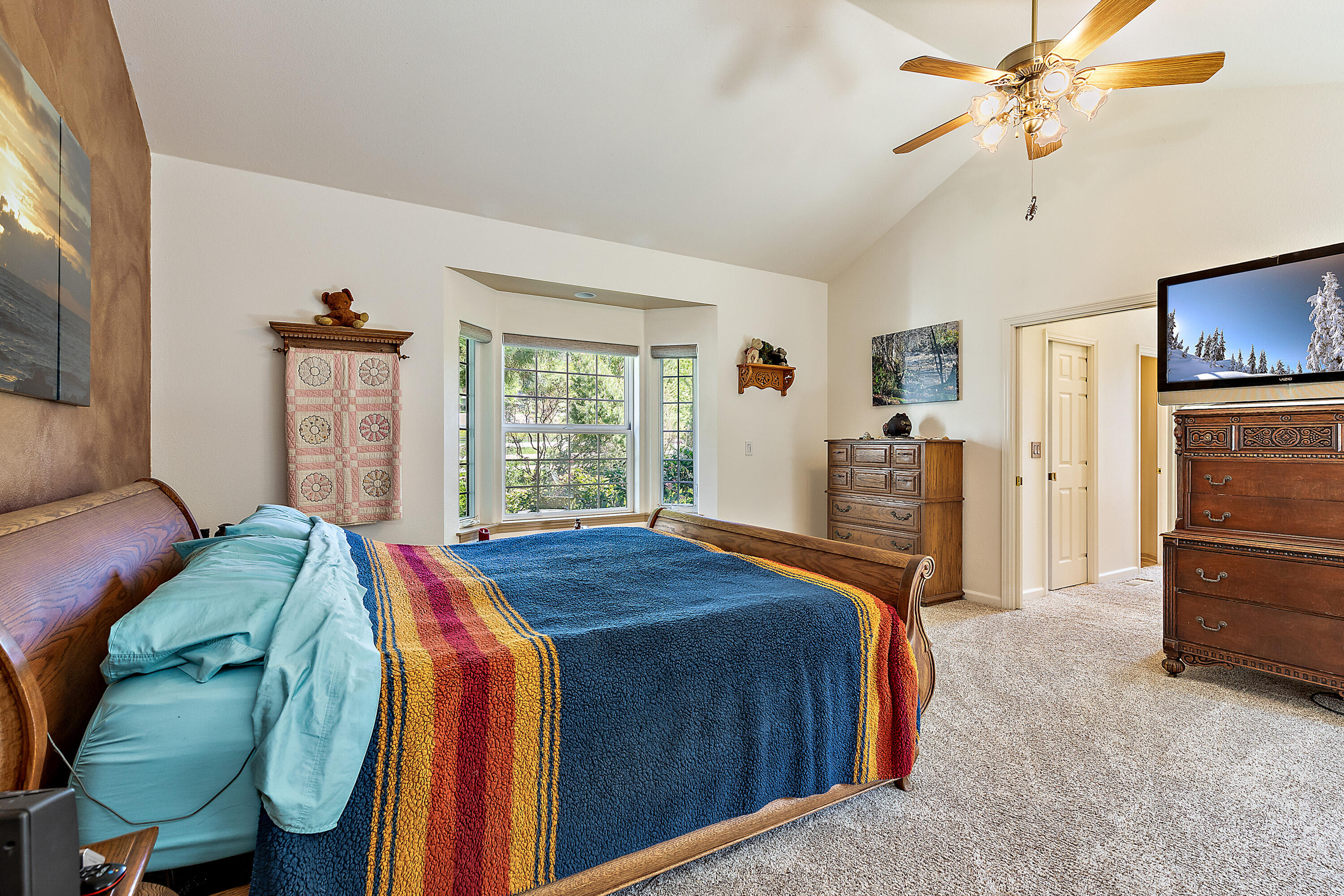 4000 Little Applegate Road Jacksonville, OR 97530 - Photo 10 of 47 a bed room with a bed and a television