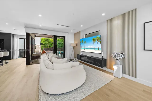 a bedroom with a bed couch and window