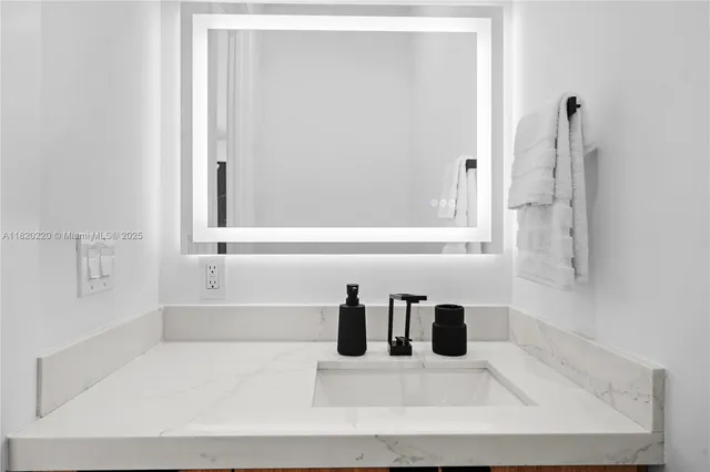 a bedroom with bed and window