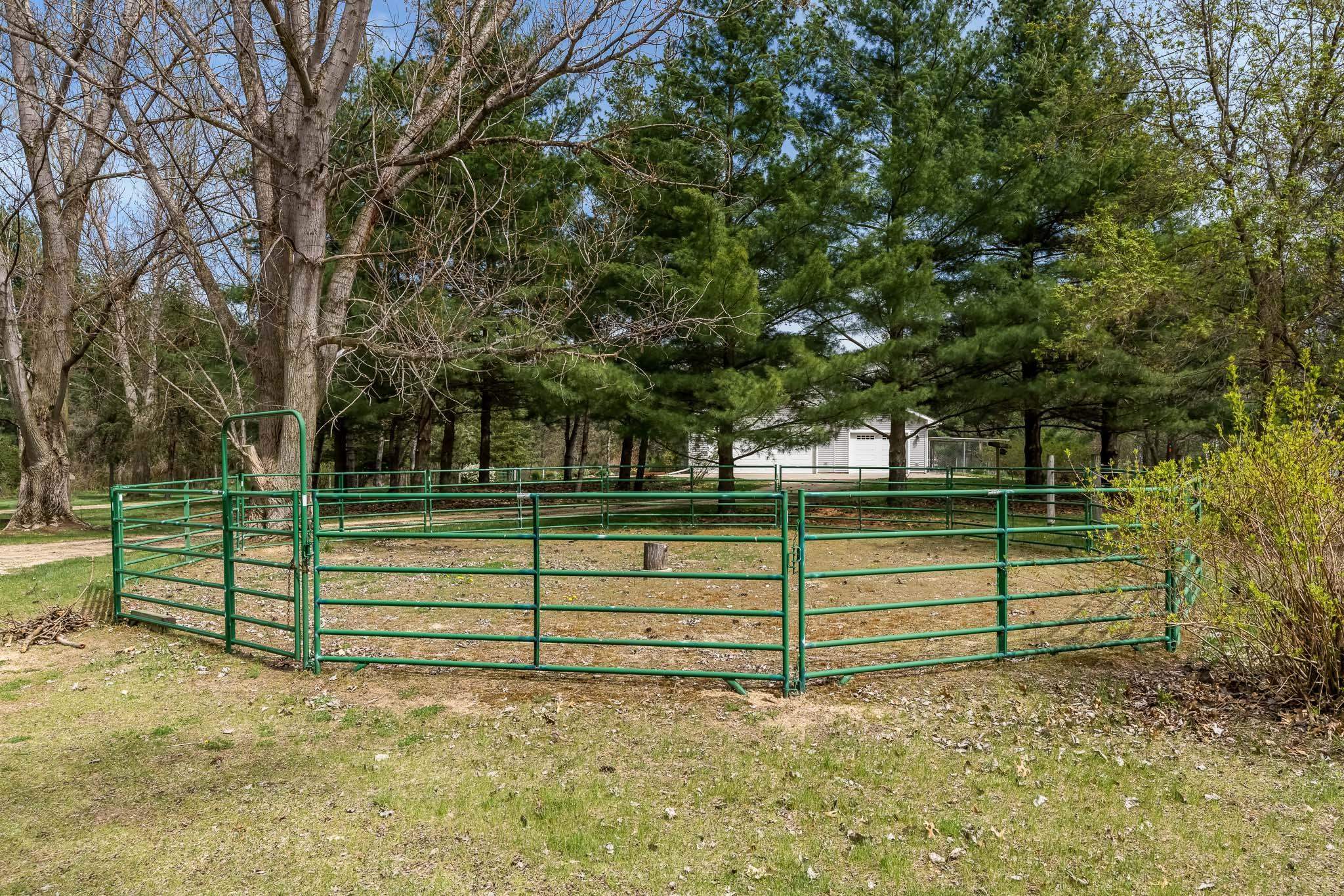 14795 Hansberry Road Rockton, IL 61072 - Photo 11 of 32 a view of a bench in a garden