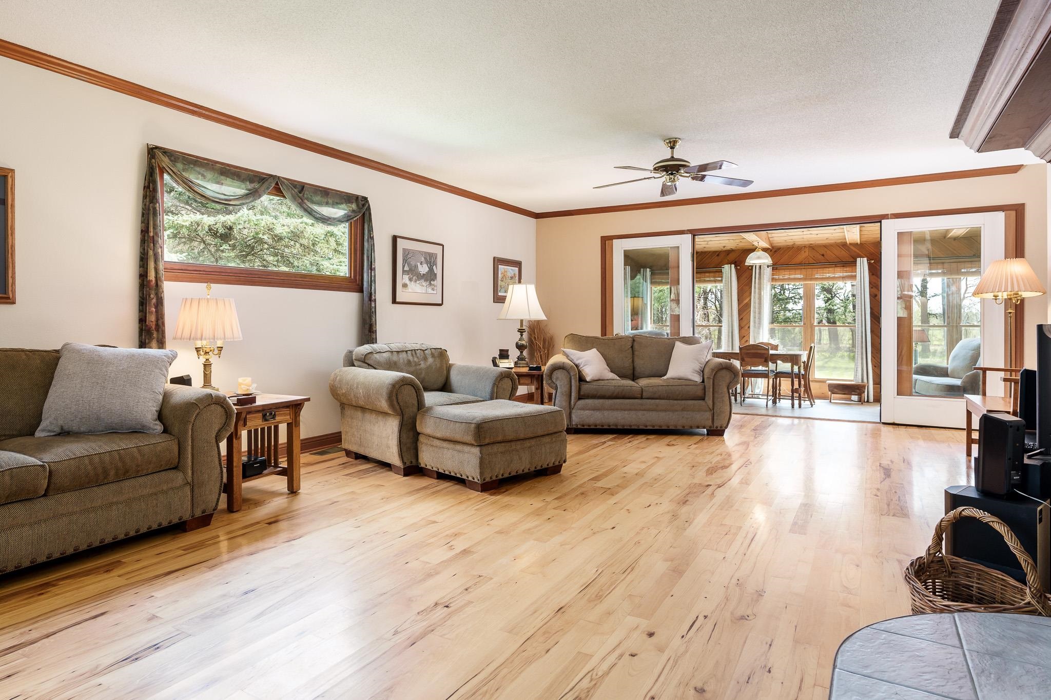 14795 Hansberry Road Rockton, IL 61072 - Photo 14 of 32 a living room with furniture and a large window
