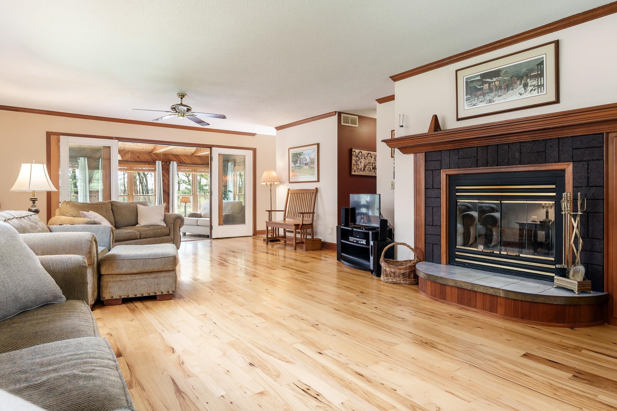 14795 Hansberry Road Rockton, IL 61072 - Photo 15 of 32 a living room with furniture and a fireplace
