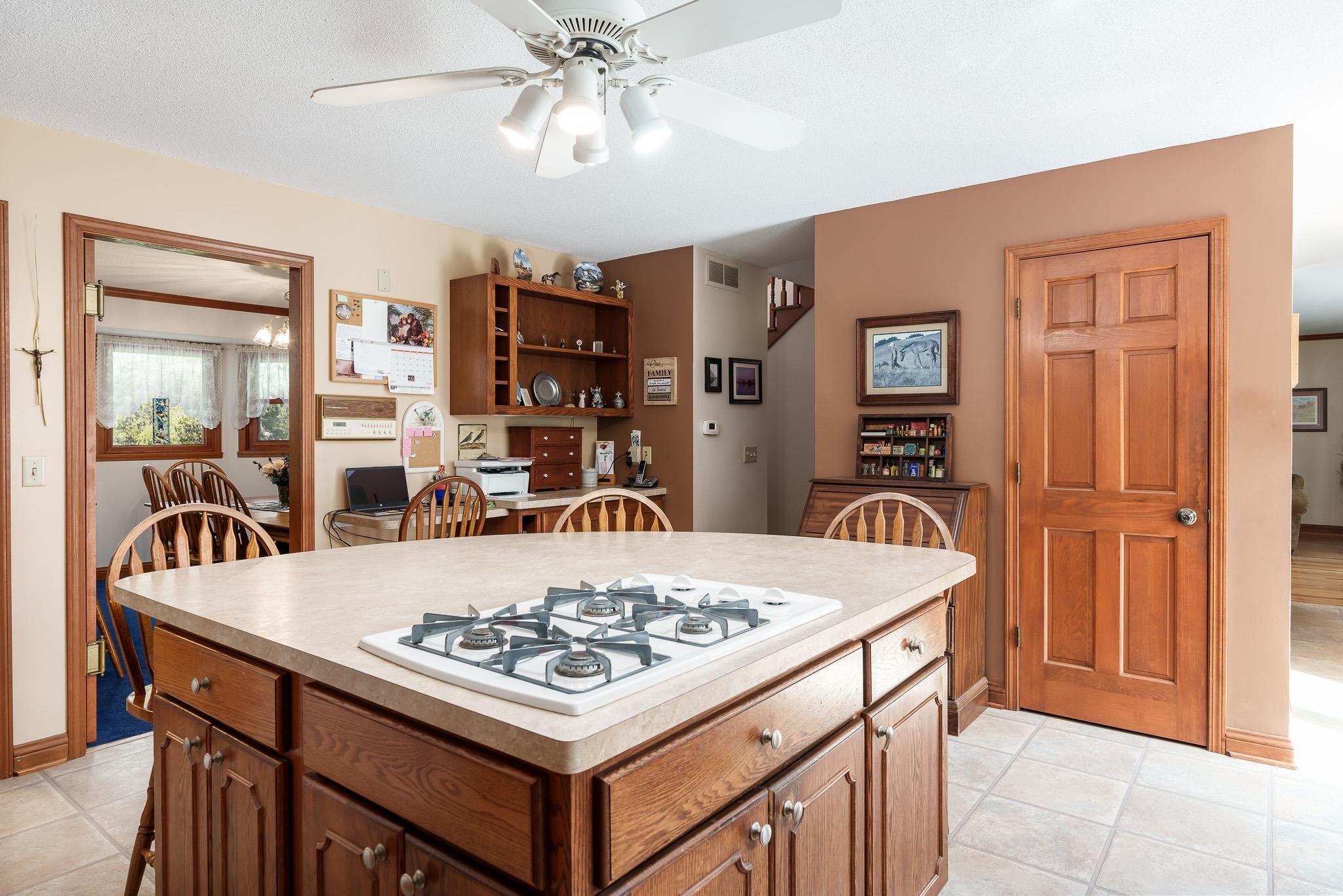 14795 Hansberry Road Rockton, IL 61072 - Photo 19 of 32 a view of a dining table and chairs