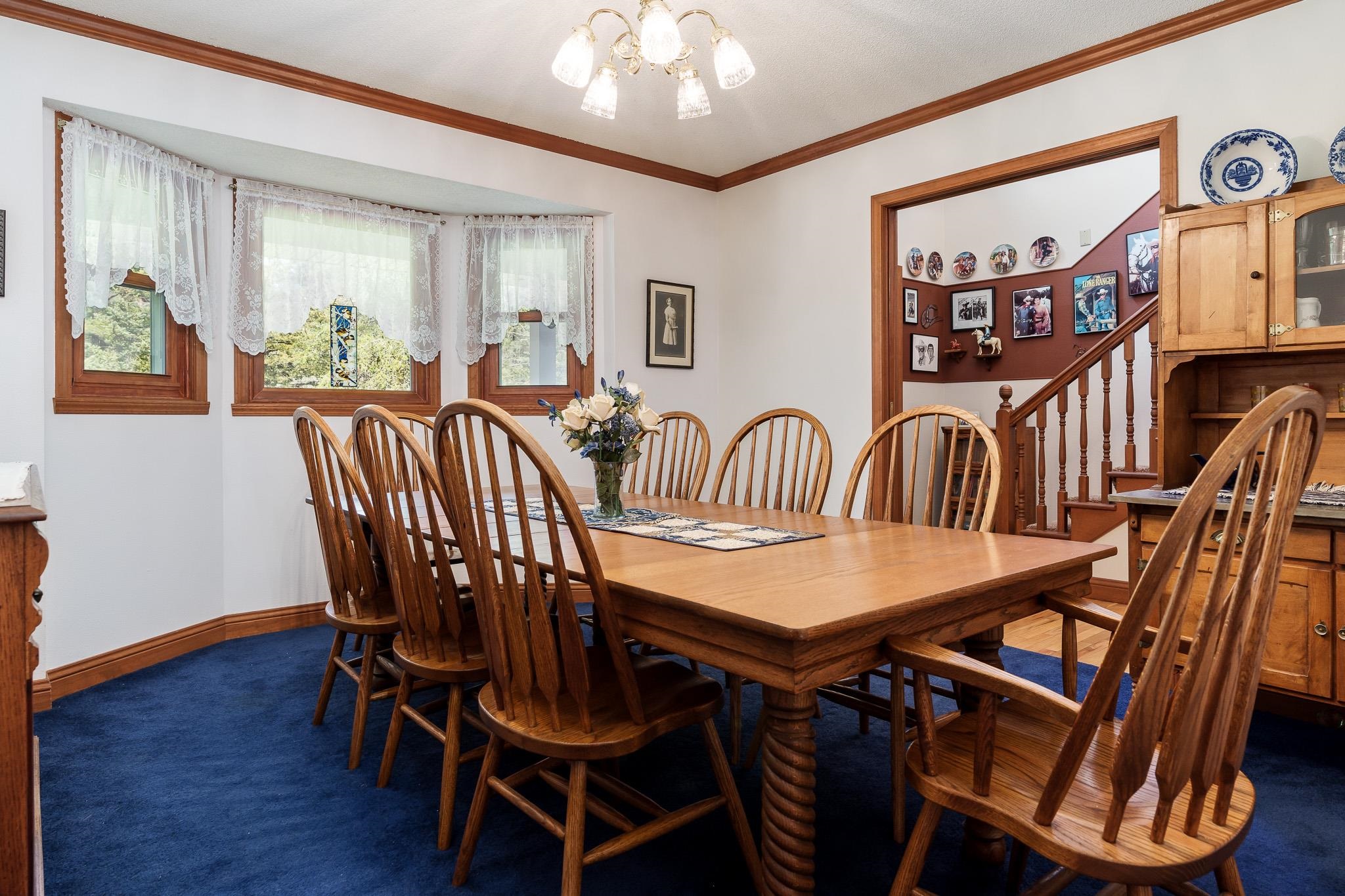 14795 Hansberry Road Rockton, IL 61072 - Photo 20 of 32 a view of a a dining room with furniture window and wooden floor