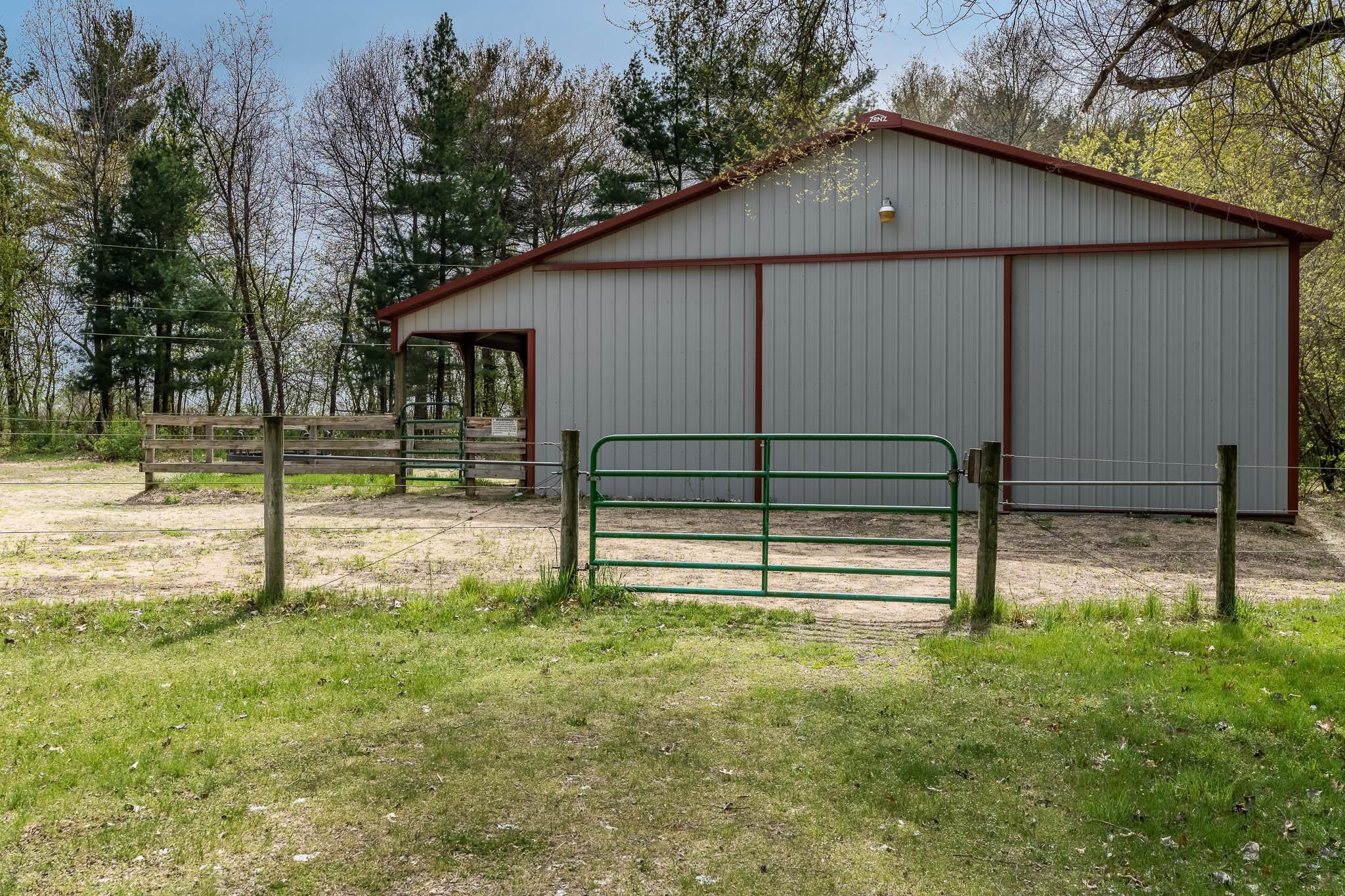 14795 Hansberry Road Rockton, IL 61072 - Photo 28 of 32 a view of backyard with small cabin