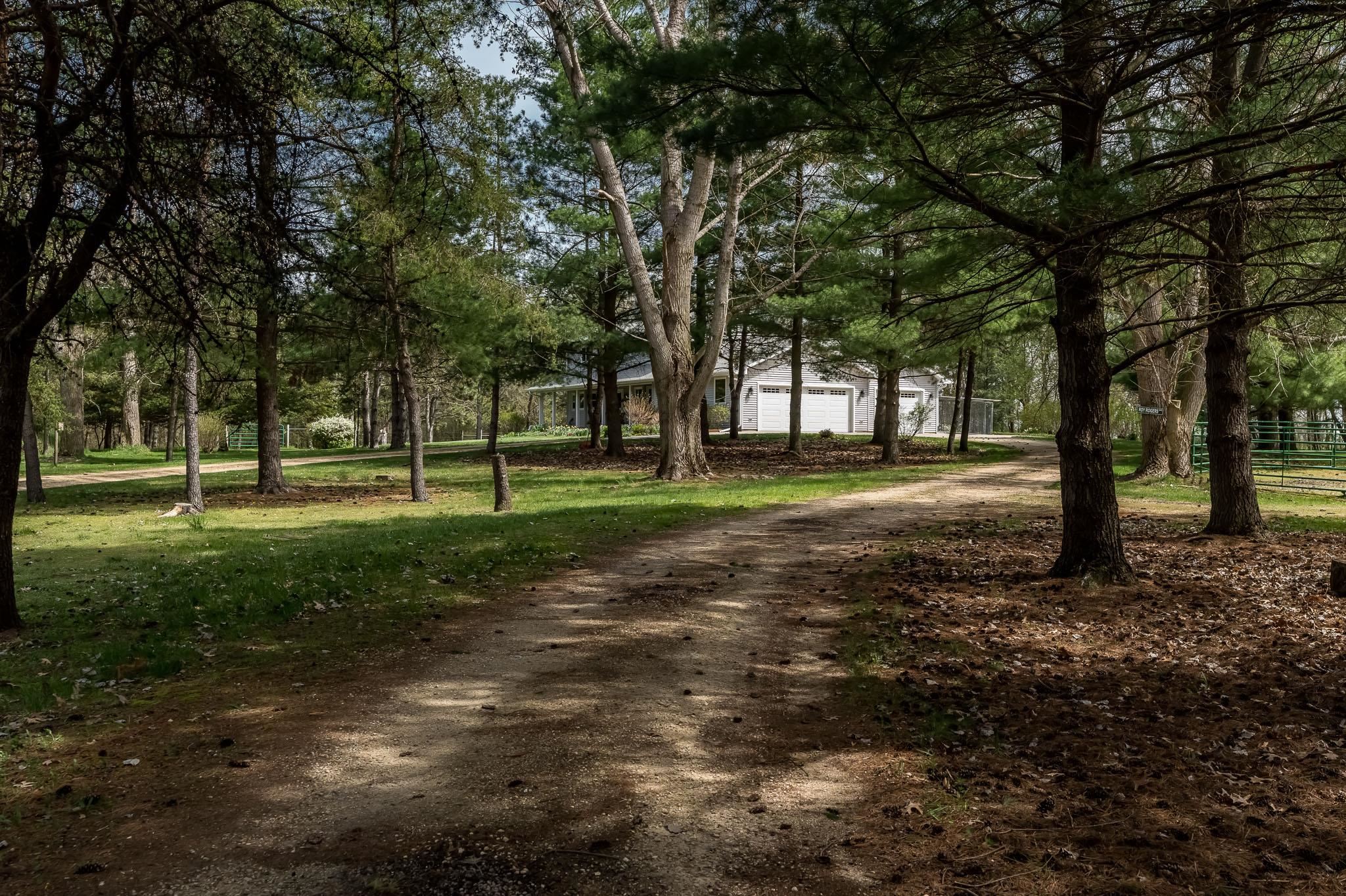 14795 Hansberry Road Rockton, IL 61072 - Photo 5 of 32 a view of a park with large trees