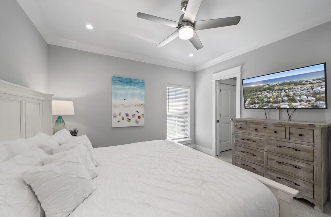 37 Grande Pointe Drive Inlet Beach, FL 32461 - Photo 26 of 58 a bedroom with a bed and a dresser