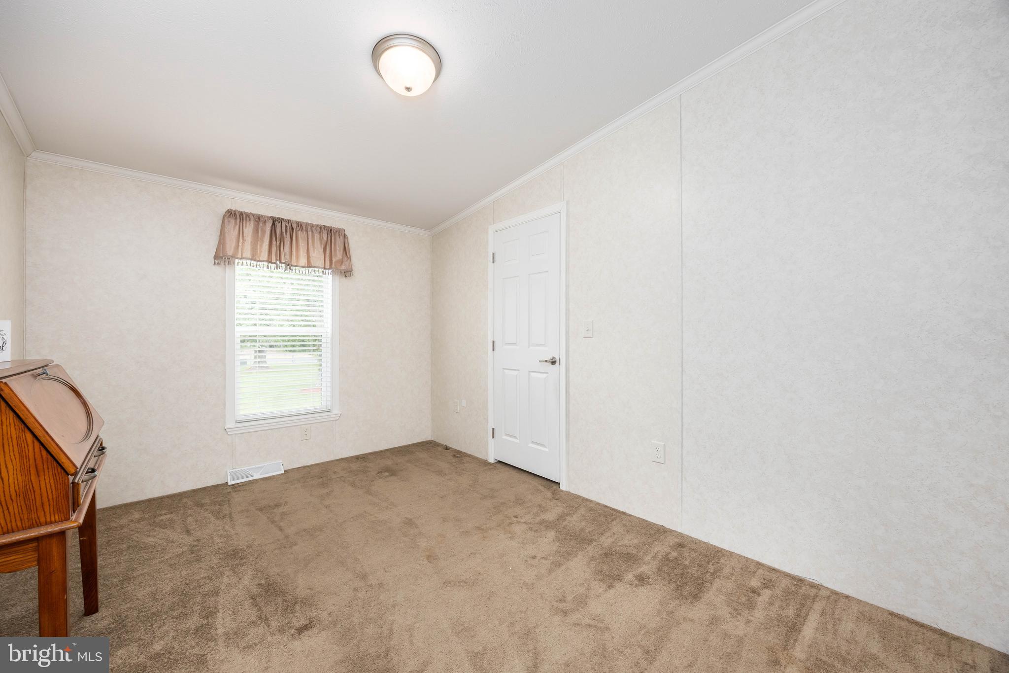 4258 Smith Road Salisbury, MD 21801 - Photo 35 of 43 an empty room with windows