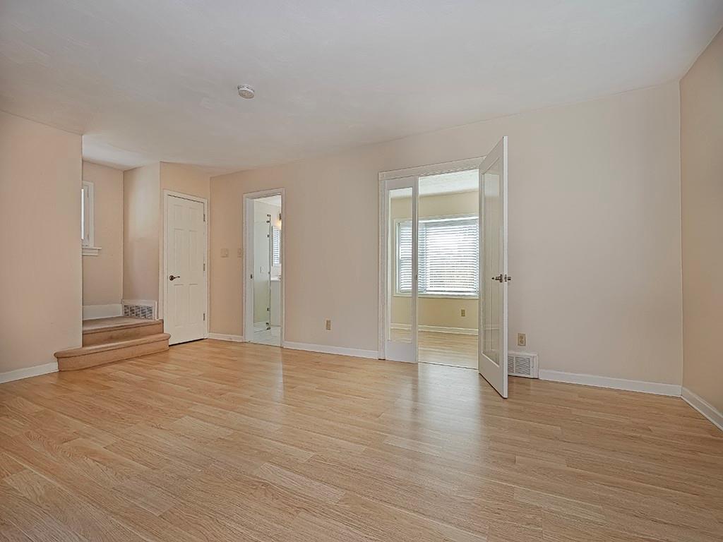 9151 Peebles Road Allison Park, PA 15101 - Photo 14 of 28 a view of an empty room with wooden floor