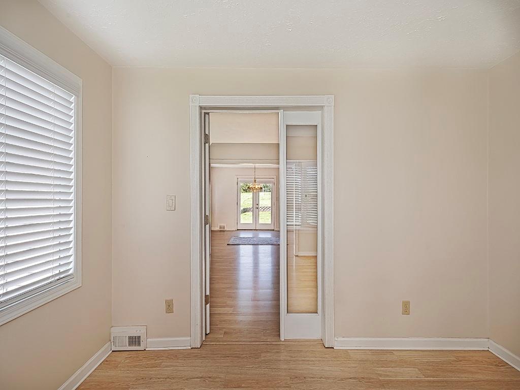 9151 Peebles Road Allison Park, PA 15101 - Photo 16 of 28 a view of empty room with wooden floor and fan