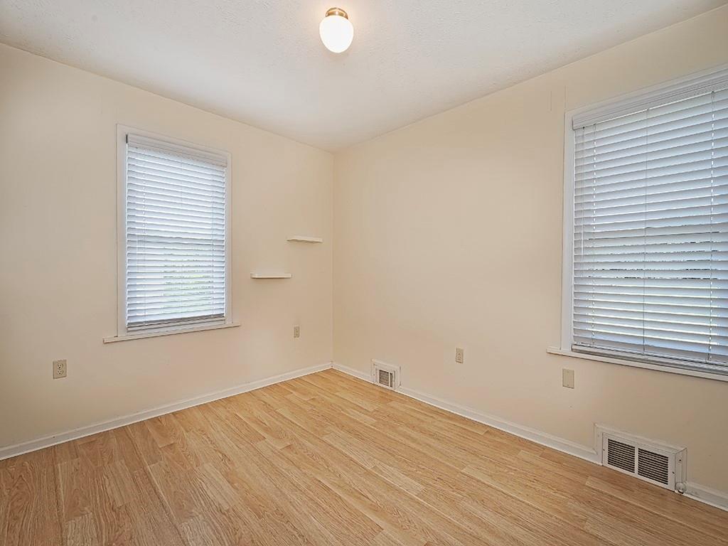 9151 Peebles Road Allison Park, PA 15101 - Photo 21 of 28 a view of empty room with wooden floor and fan