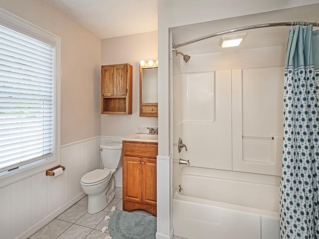 9151 Peebles Road Allison Park, PA 15101 - Photo 23 of 28 a bathroom with a toilet and a shower