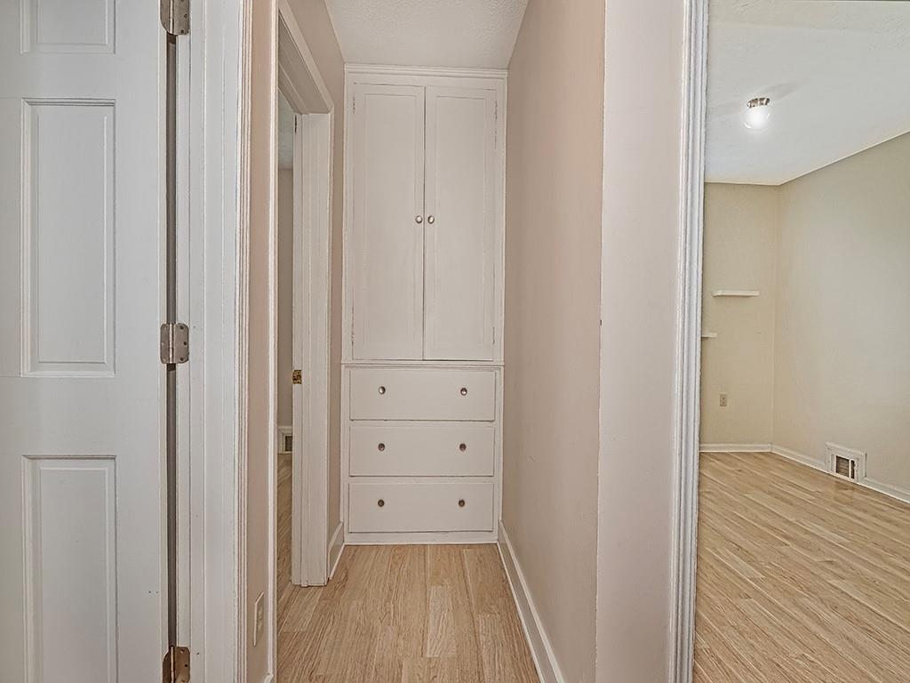 9151 Peebles Road Allison Park, PA 15101 - Photo 24 of 28 a view of a hallway with wooden floor