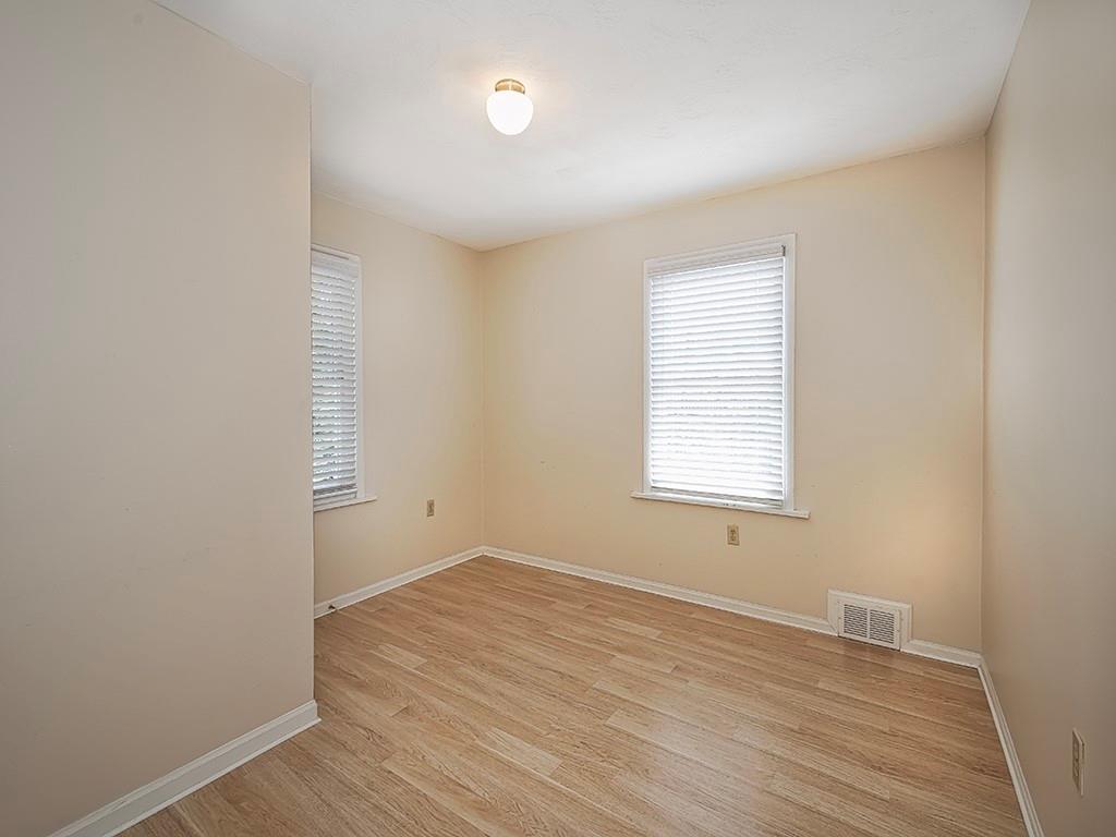 9151 Peebles Road Allison Park, PA 15101 - Photo 25 of 28 wooden floor in an empty room with a window
