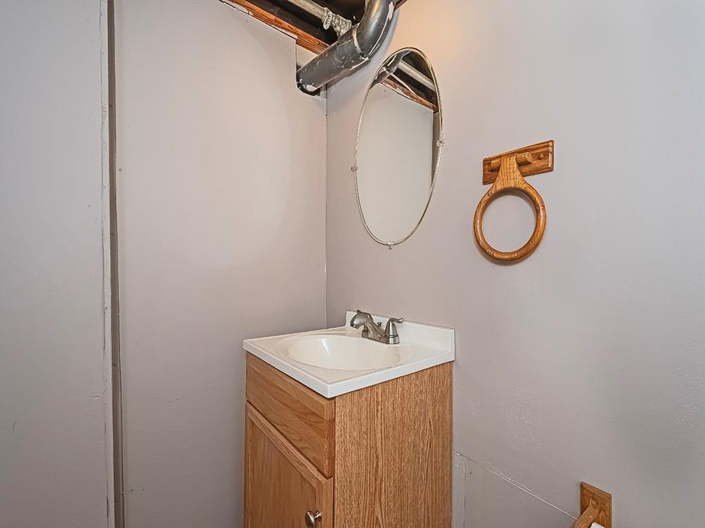 9151 Peebles Road Allison Park, PA 15101 - Photo 27 of 28 a bathroom with a sink and a mirror