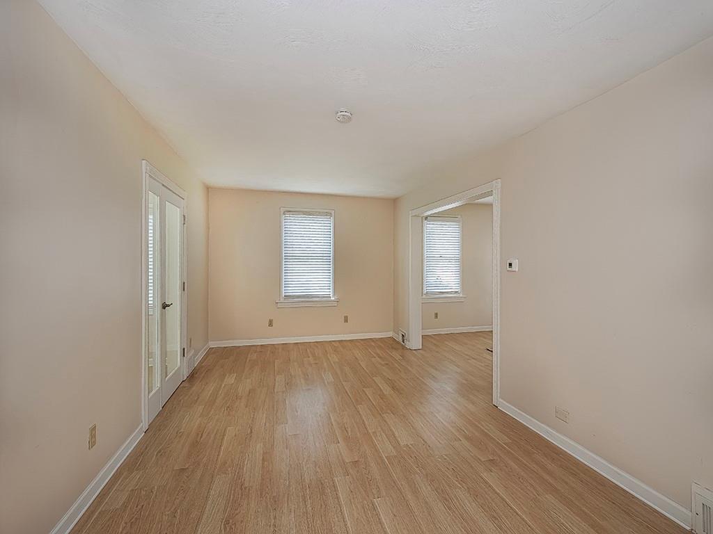 9151 Peebles Road Allison Park, PA 15101 - Photo 5 of 28 a view of an empty room with wooden floor and window