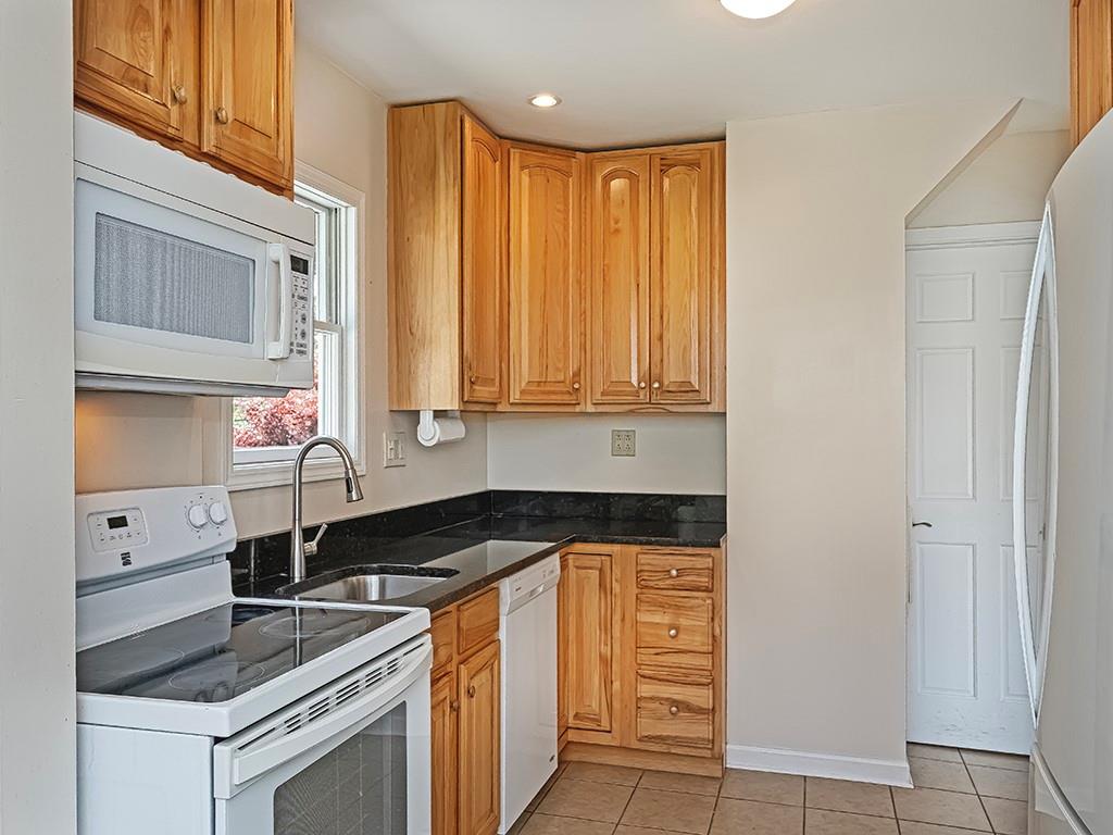 9151 Peebles Road Allison Park, PA 15101 - Photo 8 of 28 a kitchen that has a sink and a stove