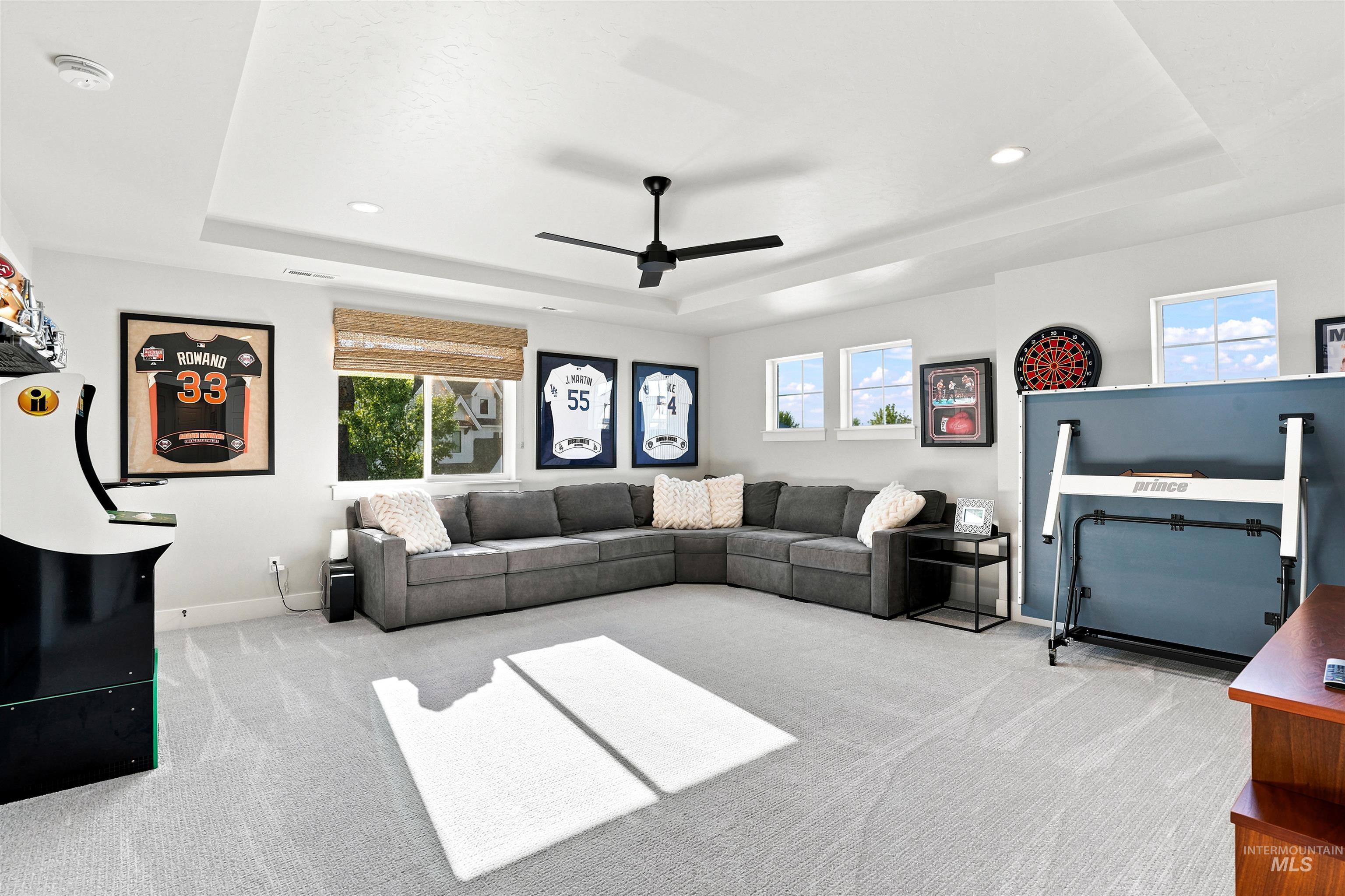 4323 West Ladle Rpds Drive Meridian, ID 83646 - Photo 27 of 49 Spacious bonus room featuring a tray ceiling, recessed lighting, and a modern ceiling fan