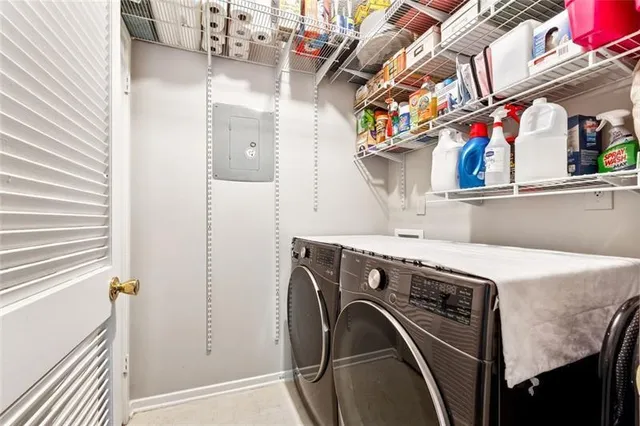 a utility room with dryer and washer