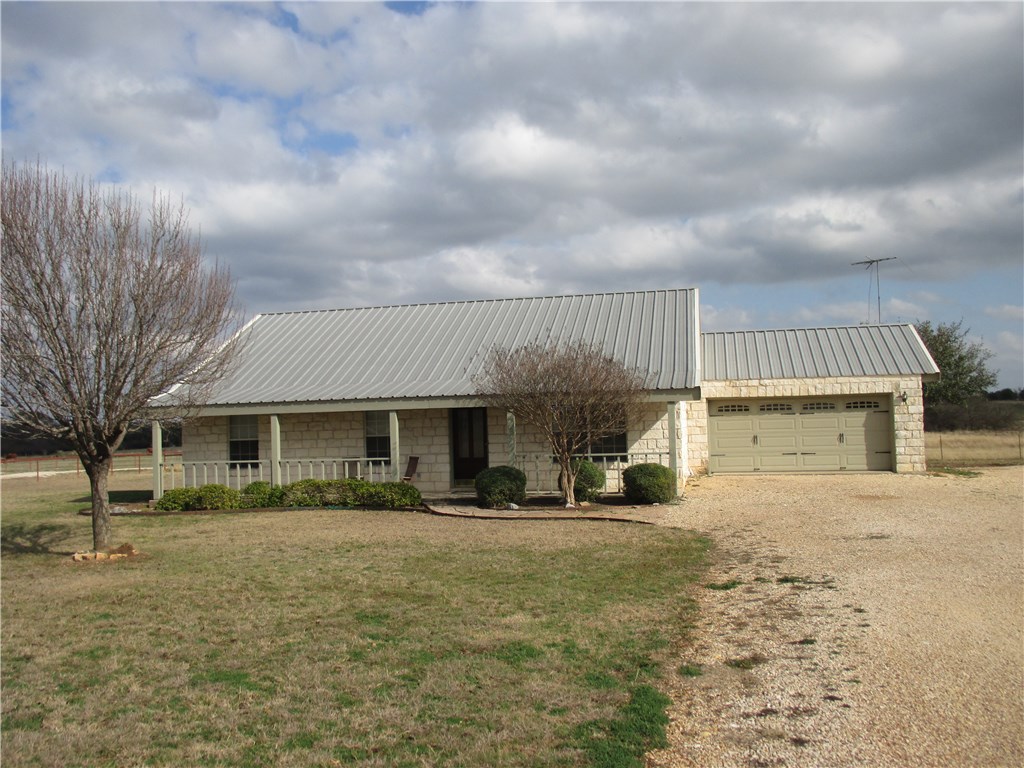a front view of a house with a patio