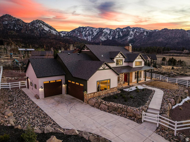 1210 East Bristle Cone Road Pine Valley, UT 84781 - Photo 2 of 54 Modern inspired farmhouse featuring stone siding, a mountain view, driveway, covered porch, and a standing seam roof