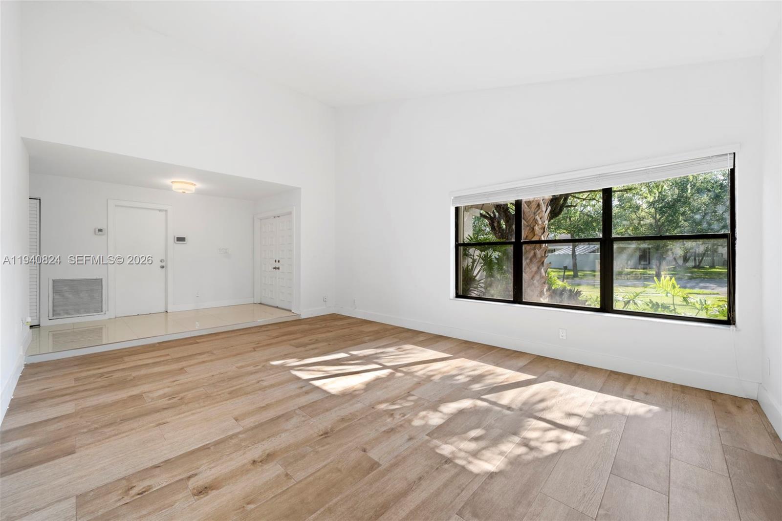 10424 Southwest 114th Court Miami, FL 33176 - Photo 15 of 23 a view of an empty room with a window