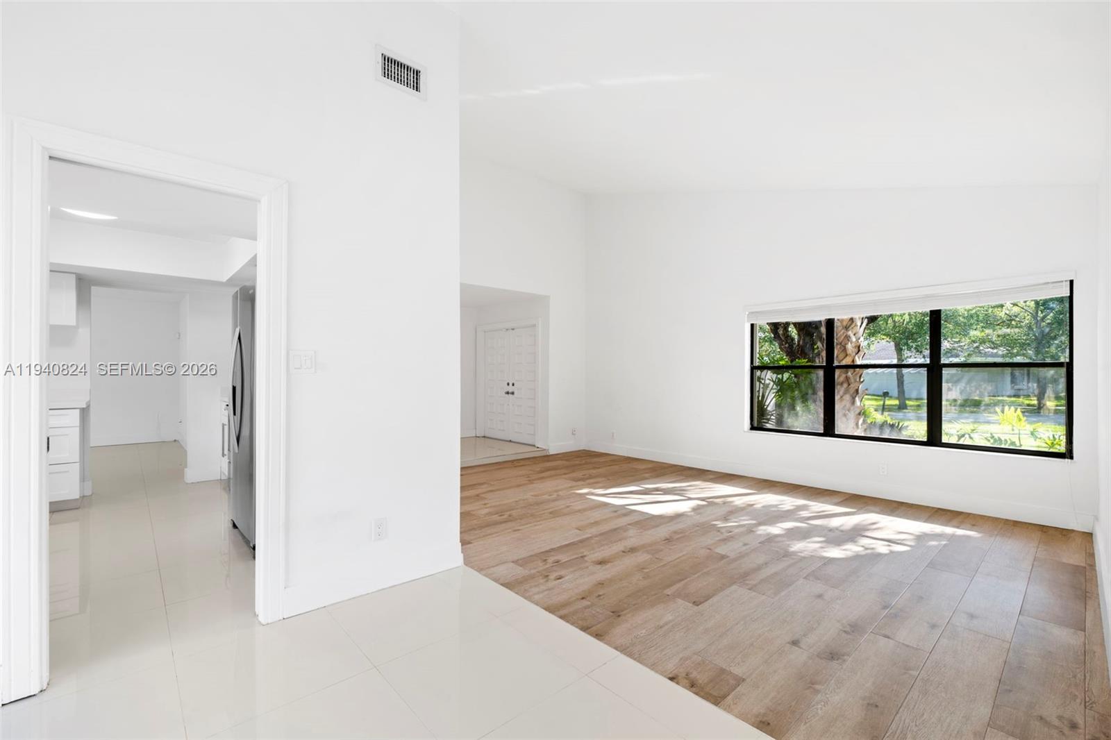 10424 Southwest 114th Court Miami, FL 33176 - Photo 18 of 23 a view of an empty room with a window