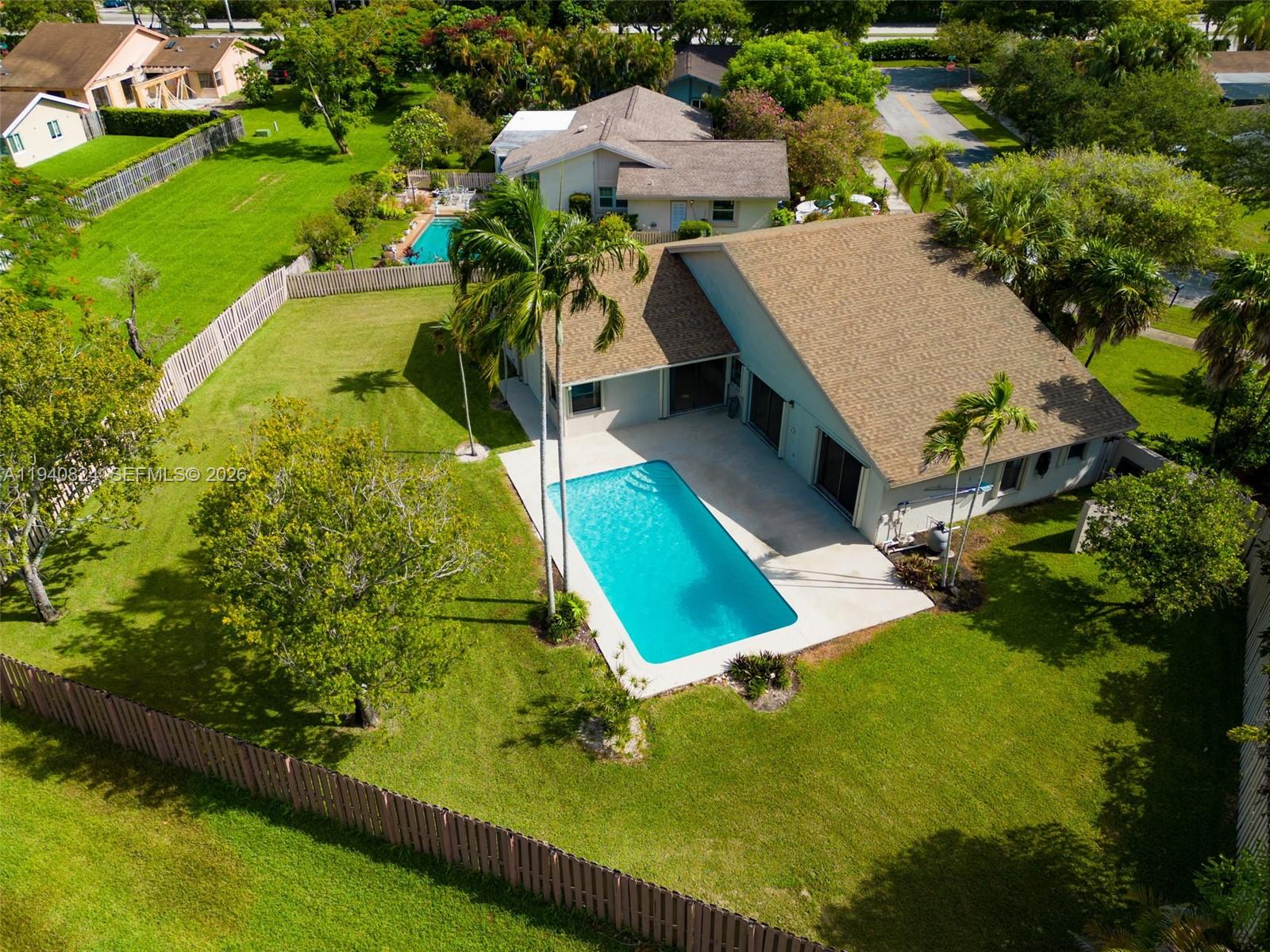 10424 Southwest 114th Court Miami, FL 33176 - Photo 2 of 23 an aerial view of a house