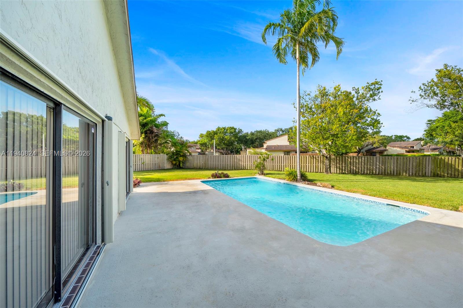 10424 Southwest 114th Court Miami, FL 33176 - Photo 22 of 23 a view of swimming pool with yard
